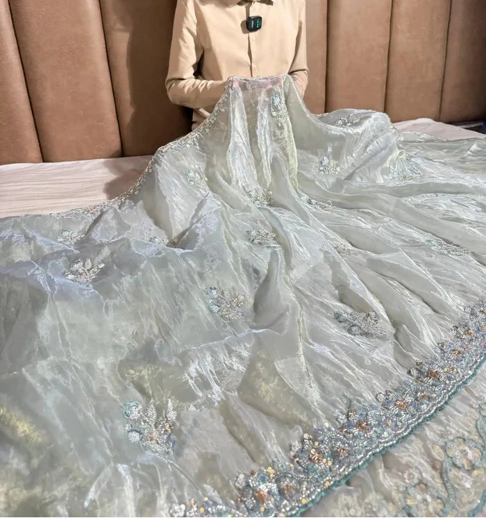 Subtle Metallic Sea Green Shimmery Tissue Silk Designer Saree