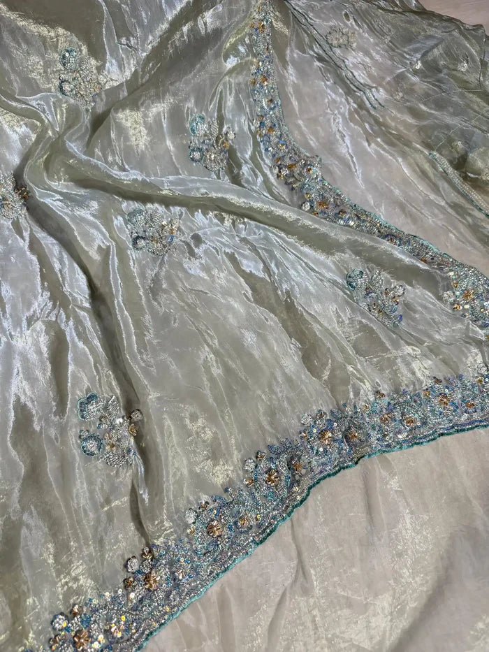 Subtle Metallic Sea Green Shimmery Tissue Silk Designer Saree