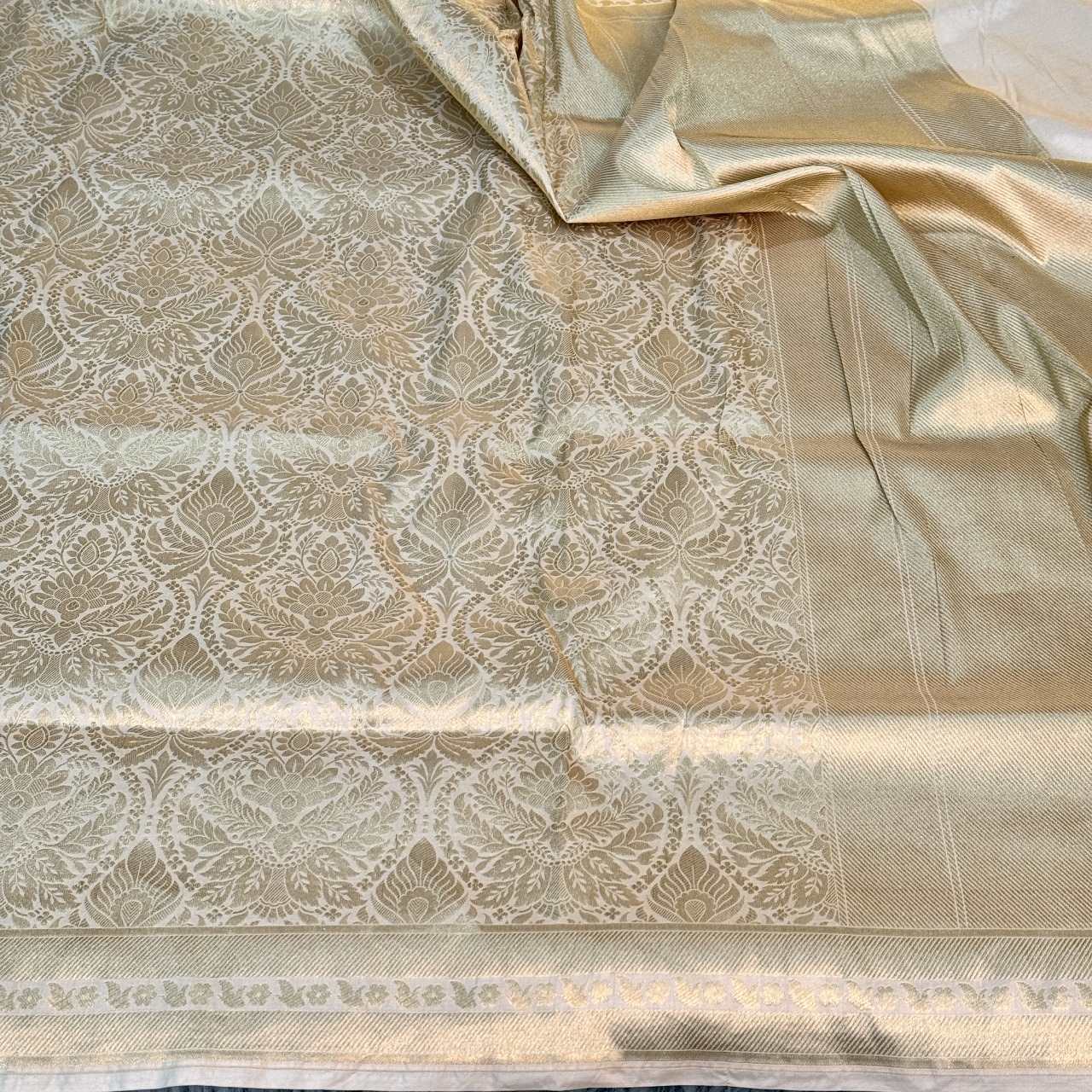 Light Cream Shade Pure Katan Silk Saree in Golden Zari Embossed Weave