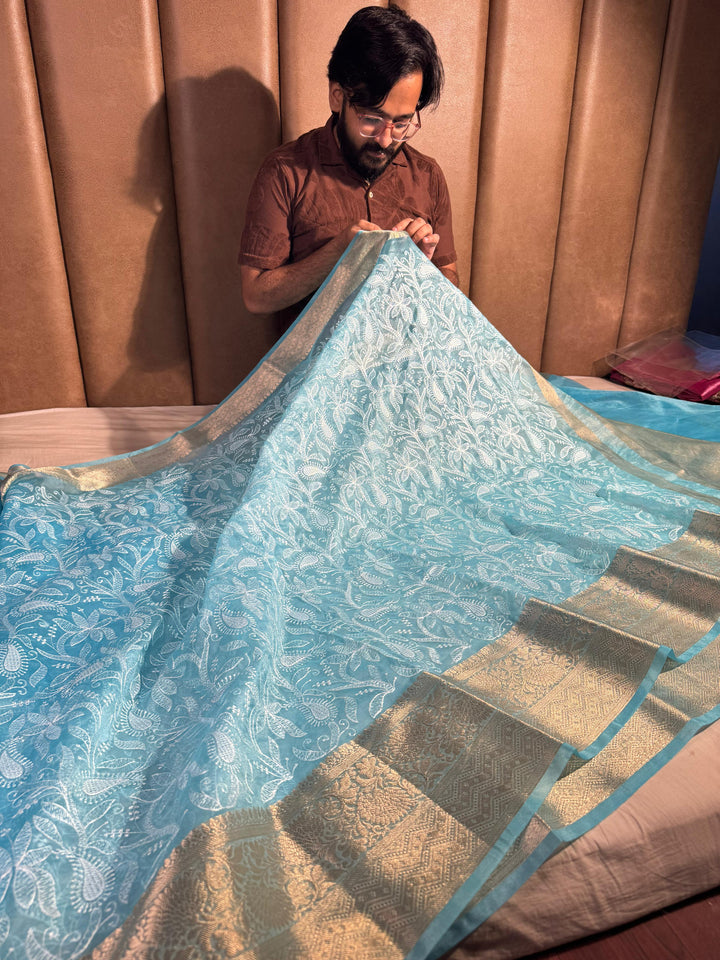 Masterpiece banarasi organza chikankari saree with zari pallu and rich texture border