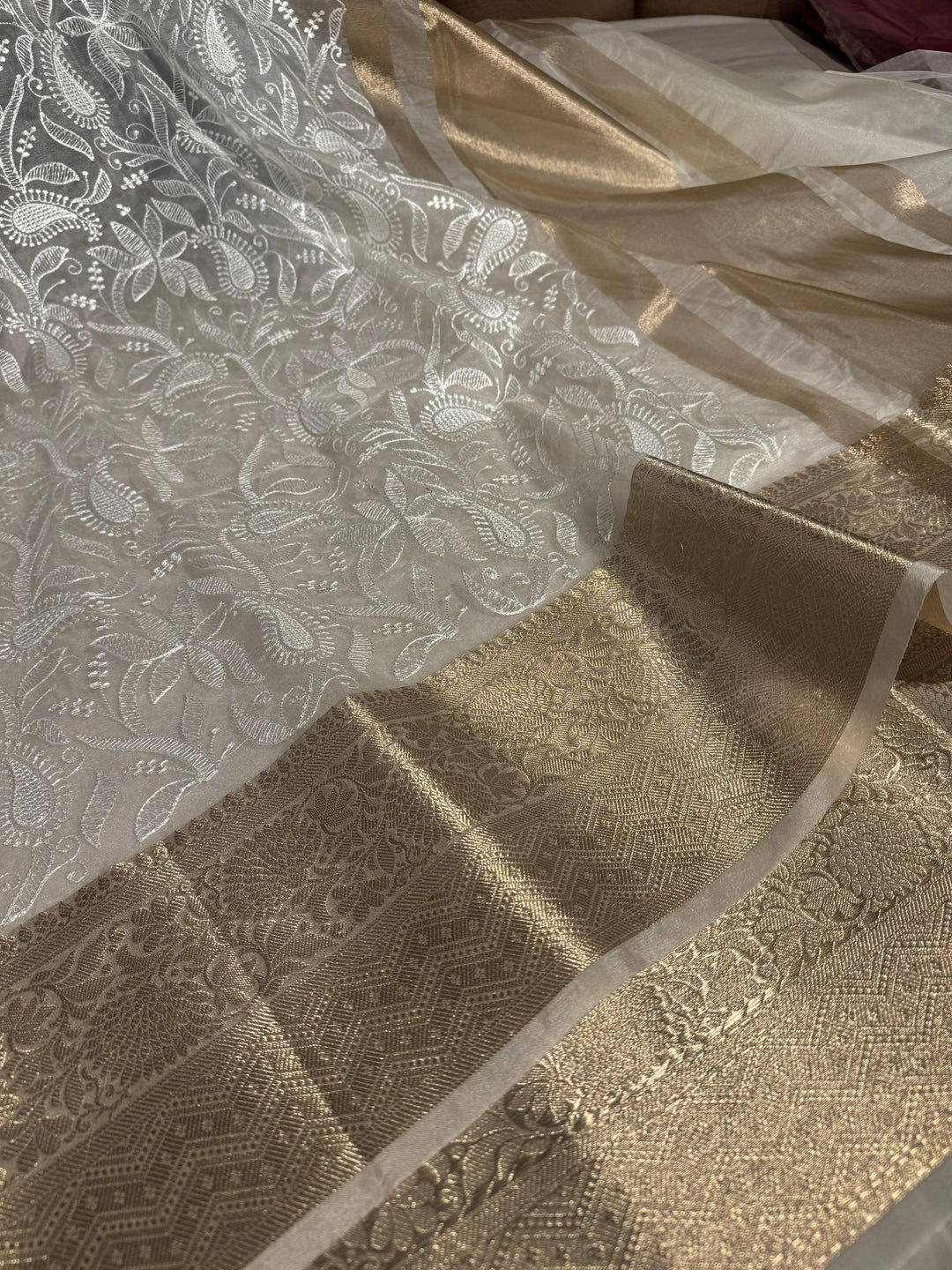 Ivory banarasi organza chikankari saree with zari pallu and rich texture border