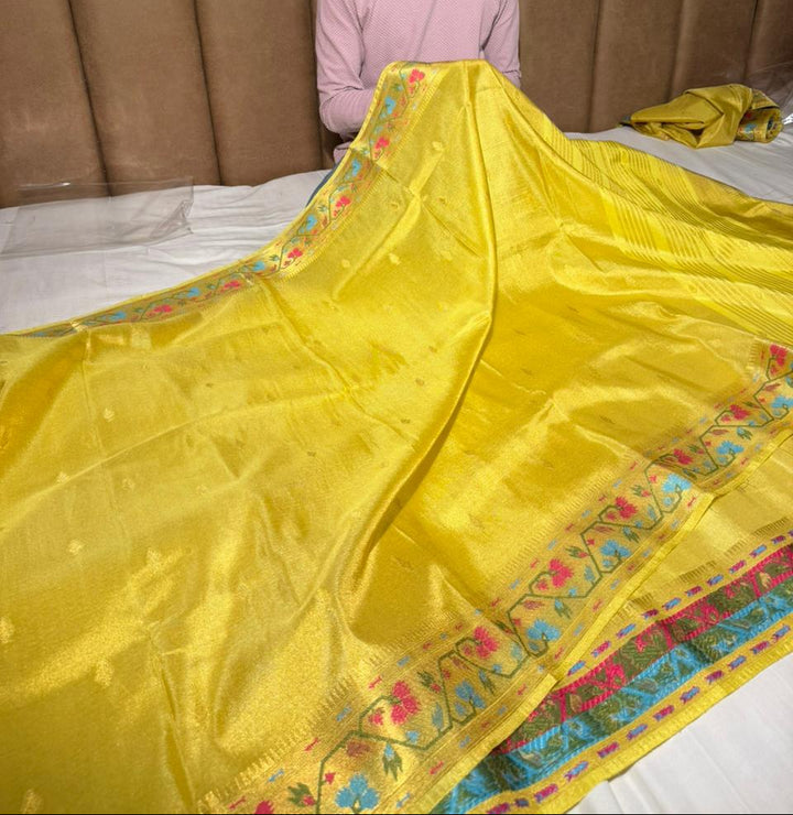 Bright Yellow Ikkat Border Breathable Katan Tissue Saree