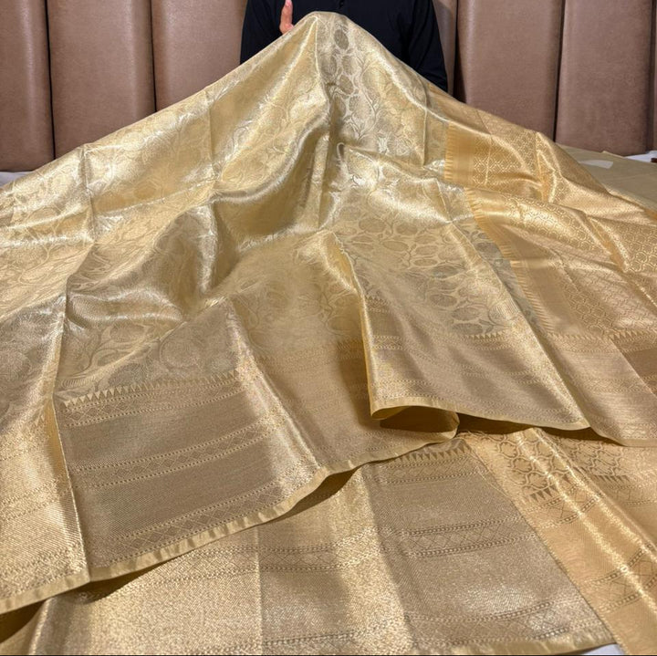 Ivory gold embossed kanjivaram tissue saree