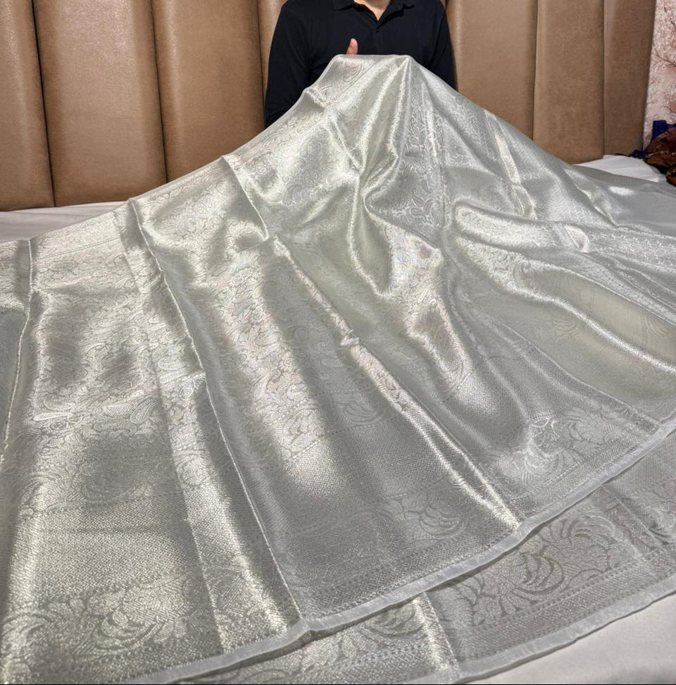 All over silver embossed kanjivaram tissue saree