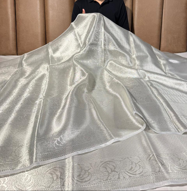 All over silver embossed kanjivaram tissue saree