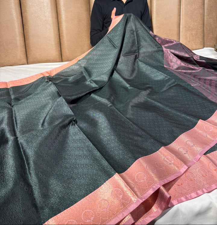 Bottle green embossed tanchoi Banarasi saree