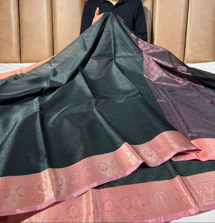 Bottle green embossed tanchoi Banarasi saree
