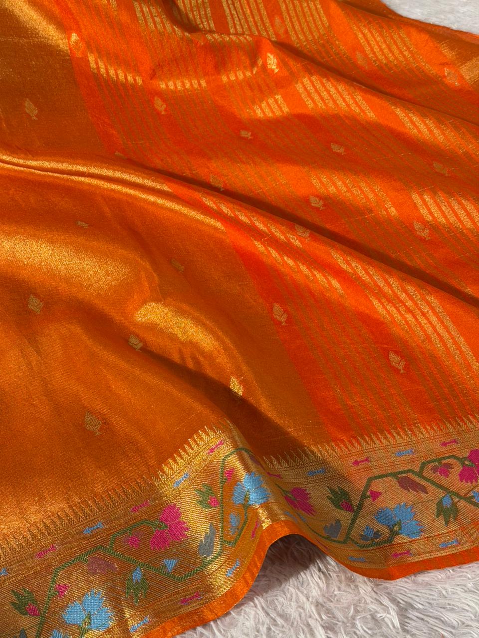 Metallic Orange Breathable tissue Ikkat Border Saree