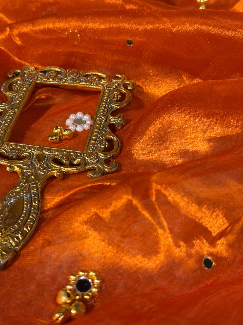 Rusted Orange Pure Tissue Silk Ghungroo Mirror Work Saree