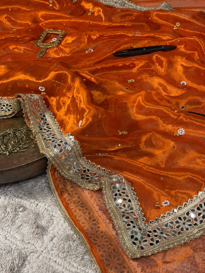 Rusted Orange Pure Tissue Silk Ghungroo Mirror Work Saree