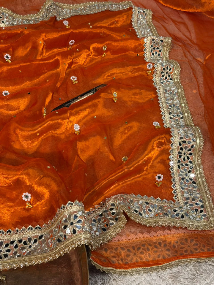 Rusted Orange Pure Tissue Silk Ghungroo Mirror Work Saree