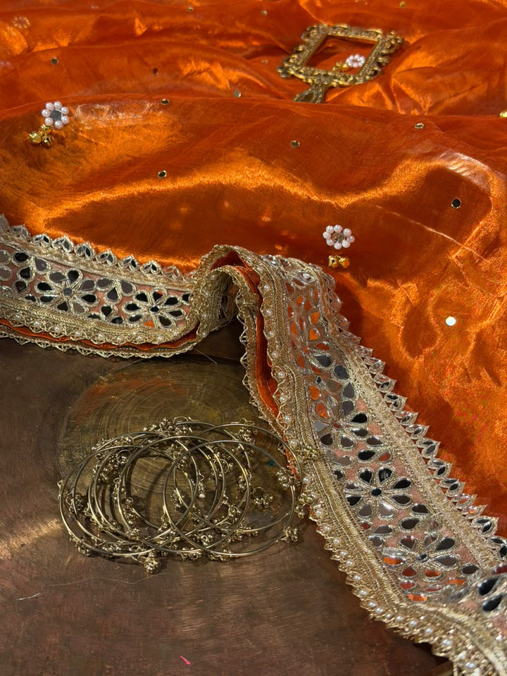 Rusted Orange Pure Tissue Silk Ghungroo Mirror Work Saree