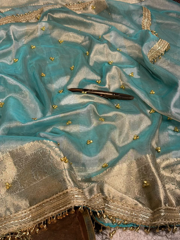 Metallic Sea Green Shade Kora Tissue Silk Banarasi Saree with Viral Ghungroo