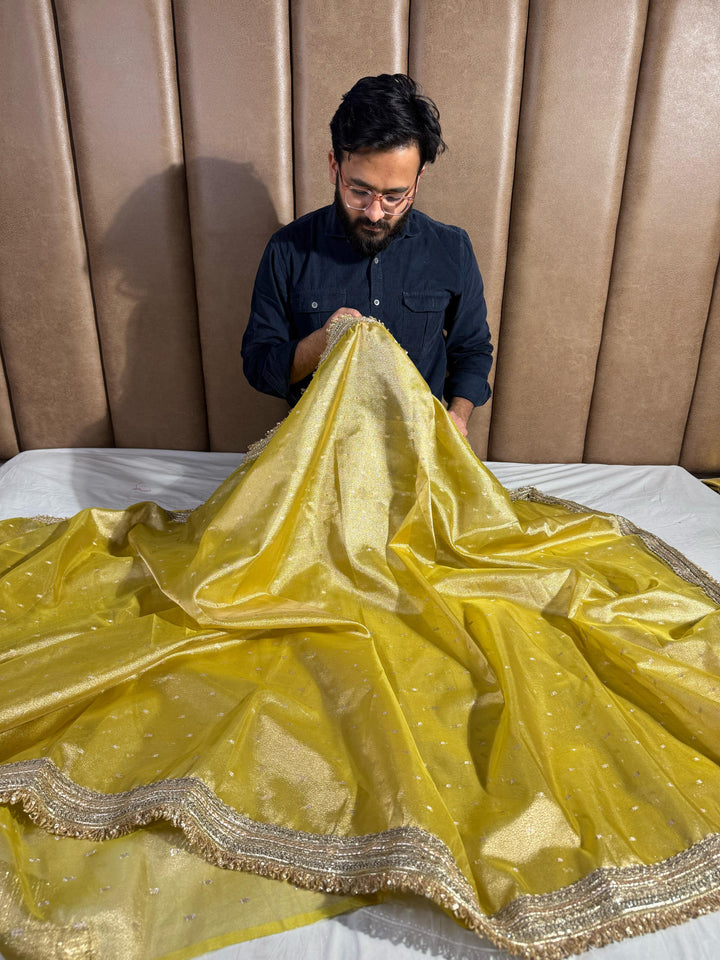 Yellow Shade Tissue Silk Saree with Heavy Lace Work