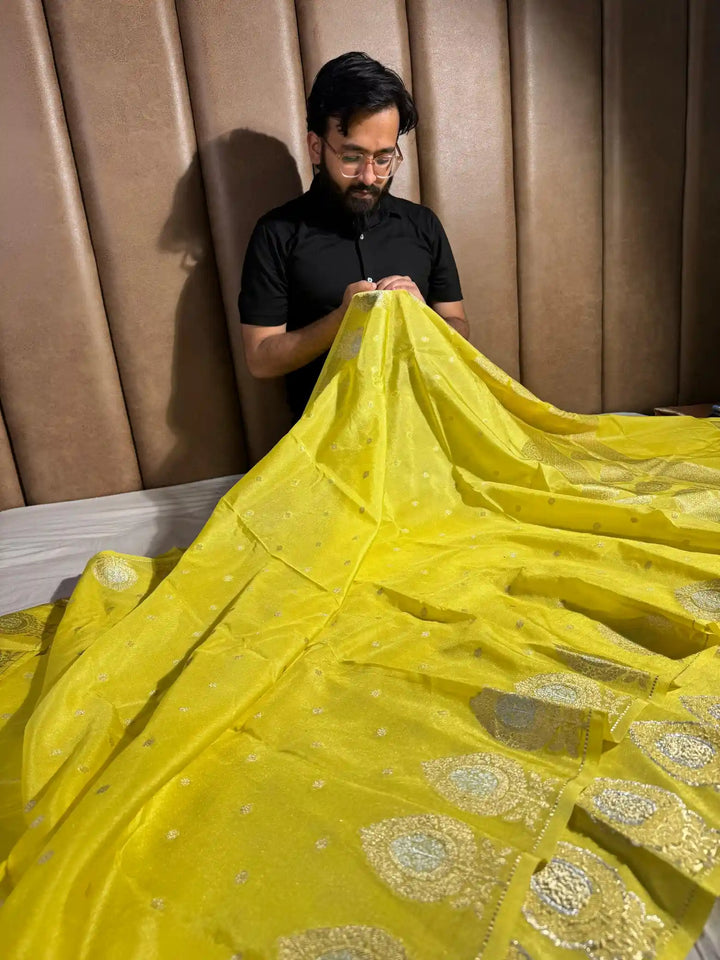 Yellow shade chiniya silk saree with rich pallu and blouse 