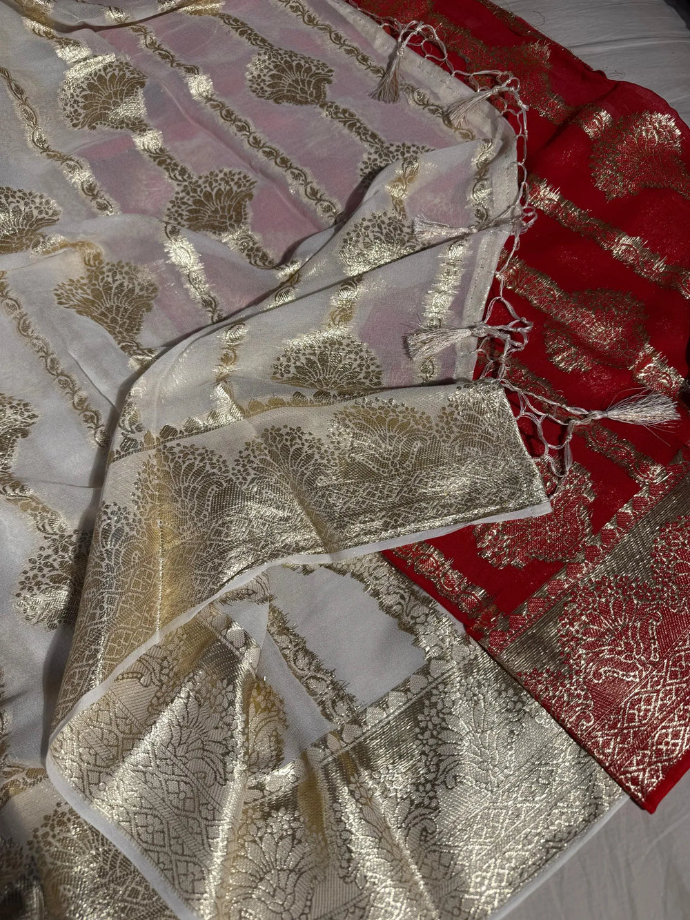 Banarasi georgette silk saree with contarst rich blouse and tassel pallu