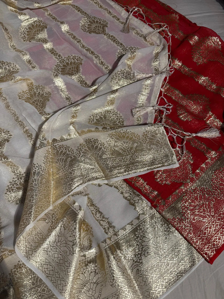 Banarasi georgette silk saree with contarst rich blouse and tassel pallu