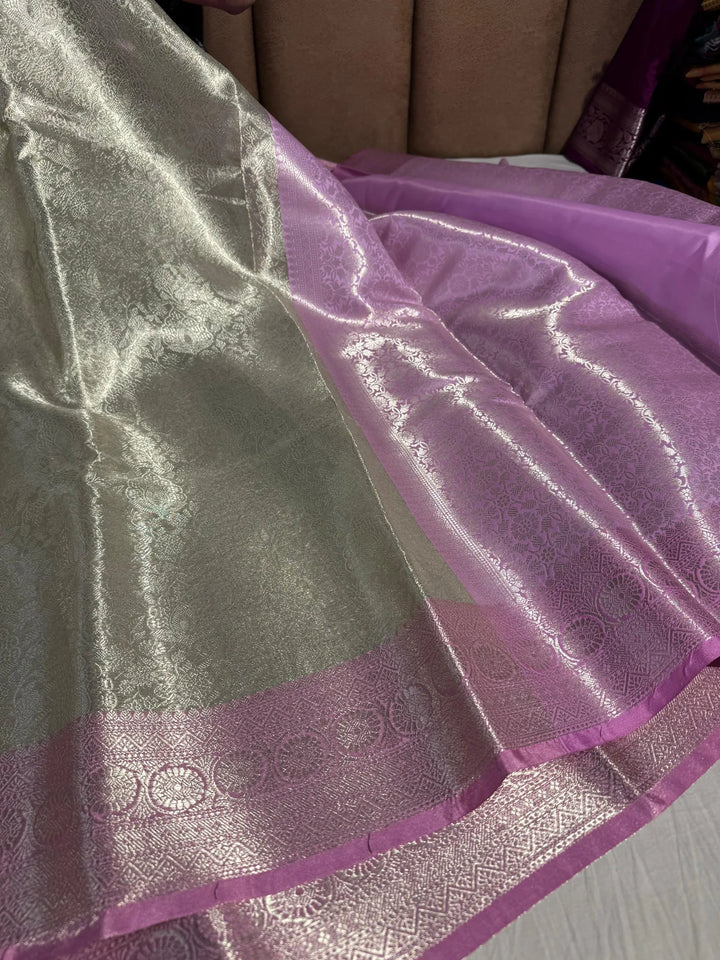 Premium kanjivaram tissue silk saree with rich pallu and blouse