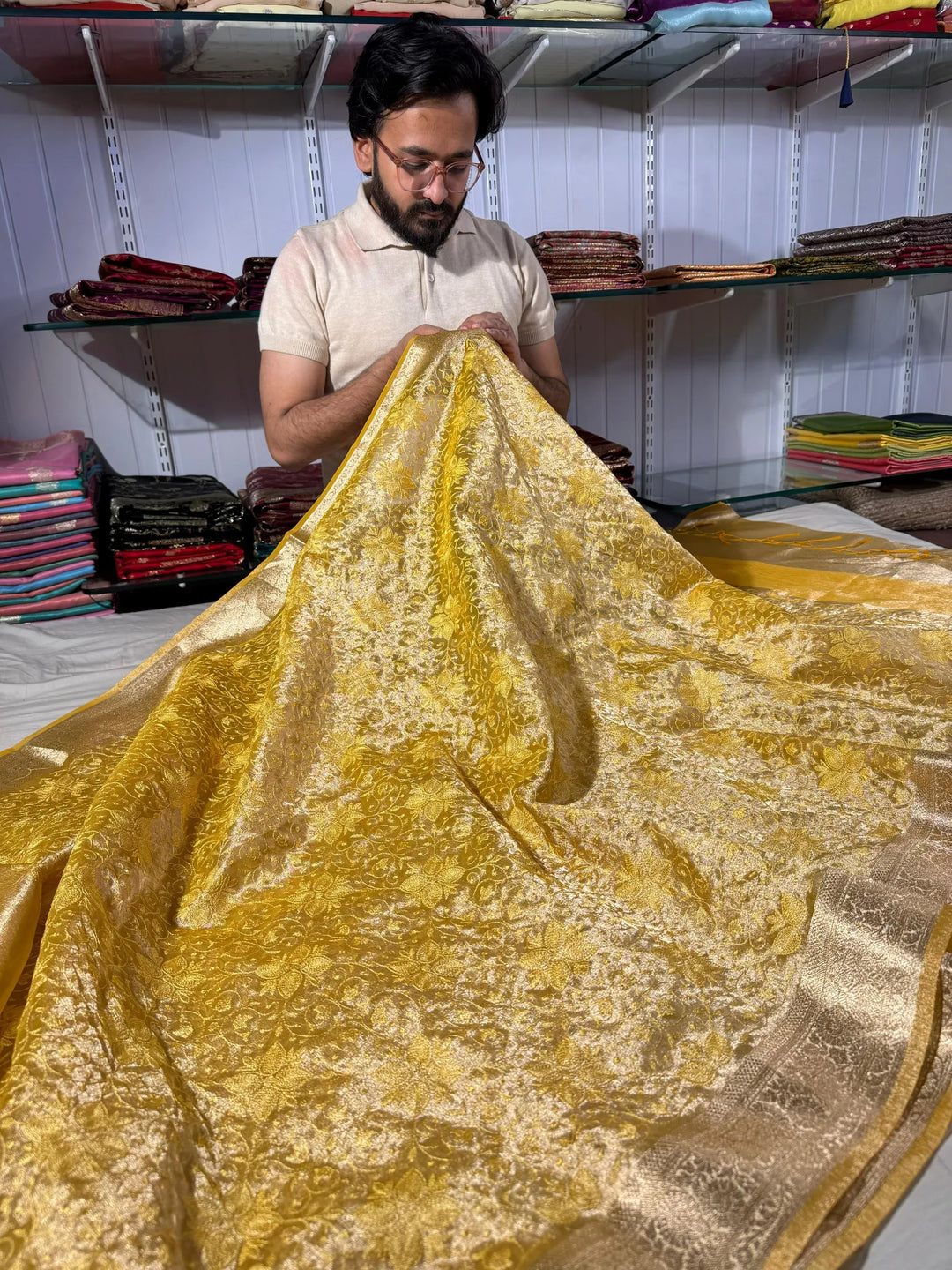 premium yellow banarasi tissue saree with rich chikankari work yet lightweight