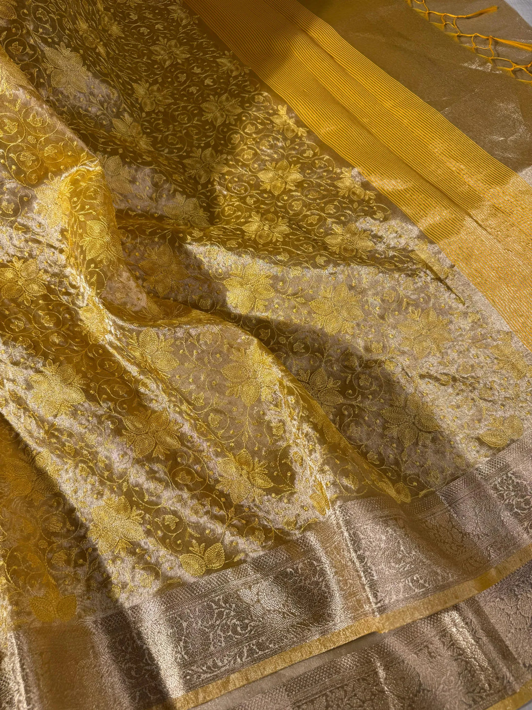 premium yellow banarasi tissue saree with rich chikankari work yet lightweight