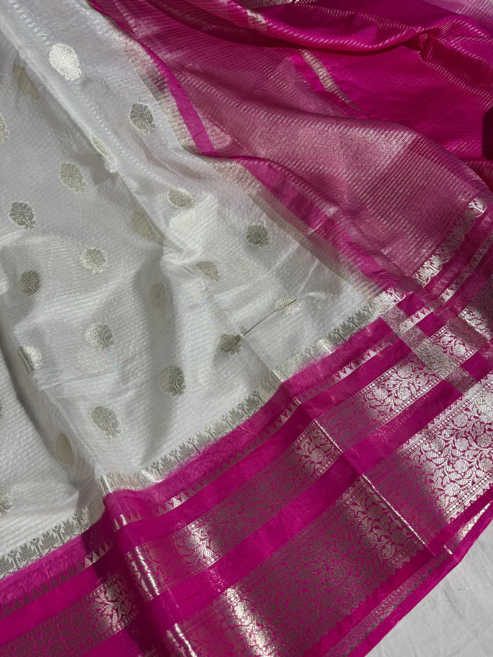 summer friendly cream with contrast rich border and pallu 