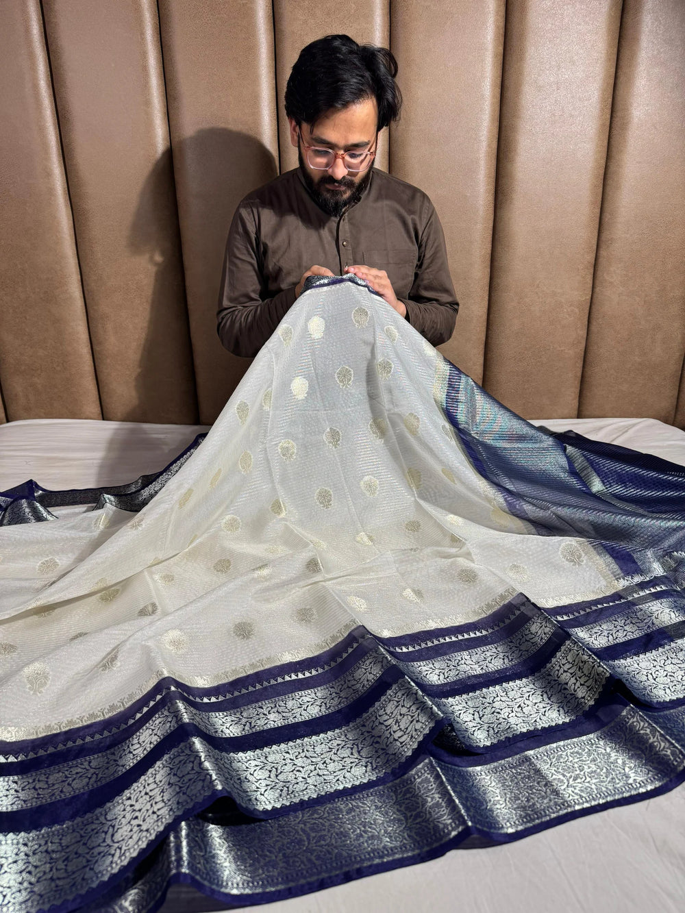 summer friendly cream with contrast rich border and pallu 