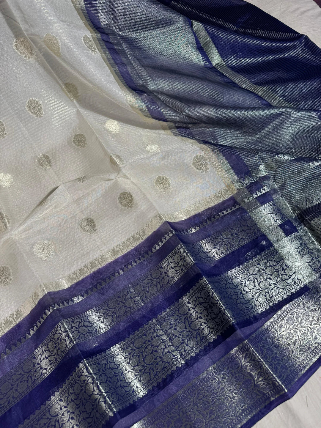 summer friendly cream with contrast rich border and pallu 