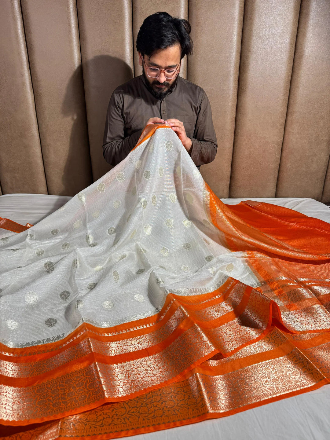 summer friendly cream with contrast rich border and pallu 