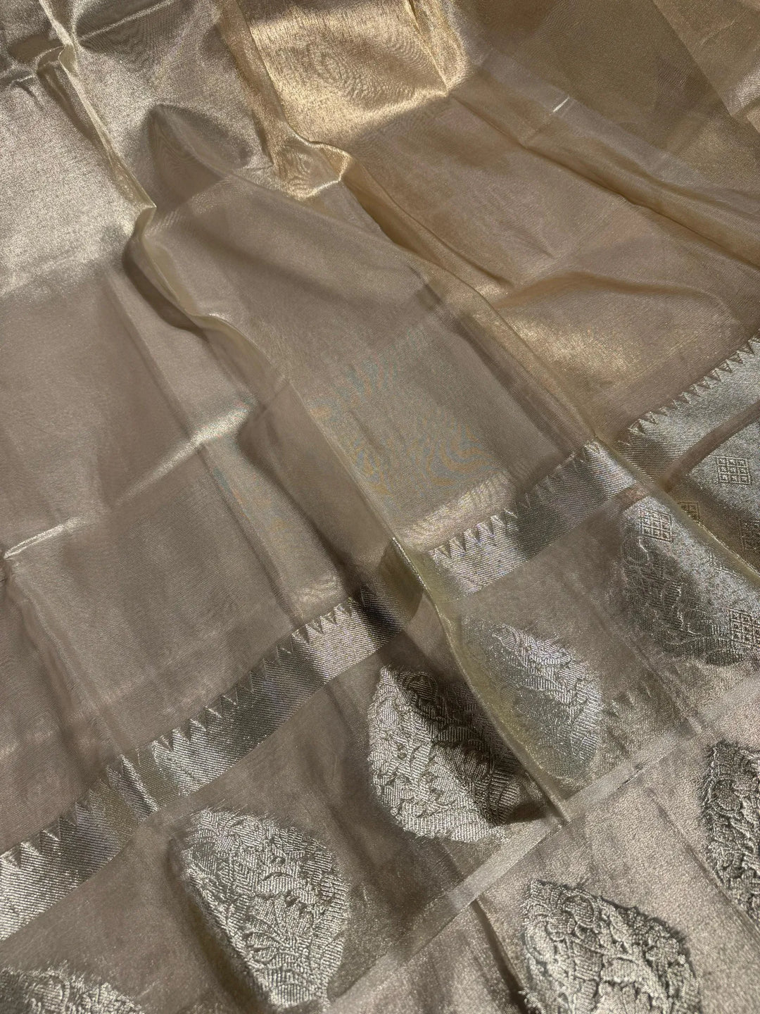water tone tissue silk saree with rich zari pallu and exclusive border 